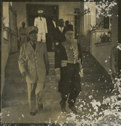 Men leaving building together