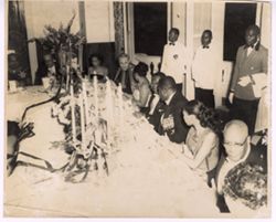 President William V. S. Tubman seated at dinner