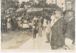 President William V. S. Tubman waits to speak as crowd continues to gather