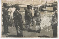 President William V. S. Tubman and small group greet each other at airport