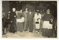 President Tubman tours a church in or near Seville, Spain with Catholic officials and other dignitaries