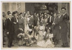 President Tubman stands with dignitaries and dancers in or near Sevilla, Spain