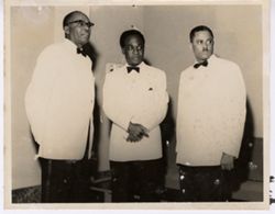 Dignitaries stand in a group