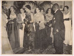 President Tubman chatting with women in formal dress