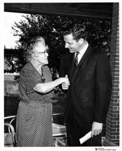 Bayh with older woman constituent