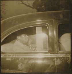 President William V. S. Tubman sits inside an automobile
