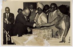 Mrs. Tubman greets with Vice President Tolbert as President Tubman stands by