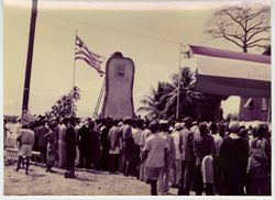 Crowd gathered before monument in Sinoe county