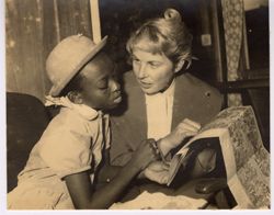 Coocoo Tubman and woman examining map