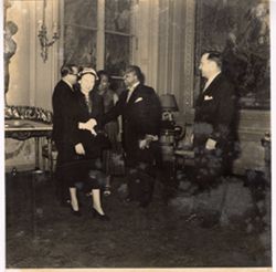 Ambassador and Mrs. Knight greeting Dr. Evans, the Director General of Unesco