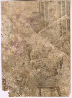 Damaged portrait of President William V. S. Tubman