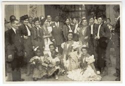 President Tubman stands with dignitaries and dancers in or near Sevilla, Spain