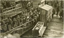 Patients boarding the USS Wilhelmina along the Garonne River at Bassens, France