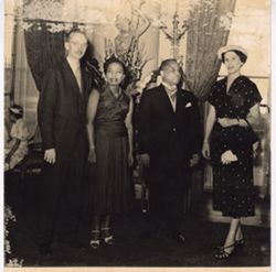 Representative of the American ambassador and Mrs. Moore lined up for group portrait