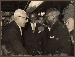 Commander Achille Lauro receiving President Tubman