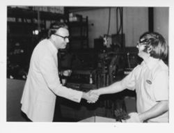 Versailles factory: Hamilton with a worker named Clinton