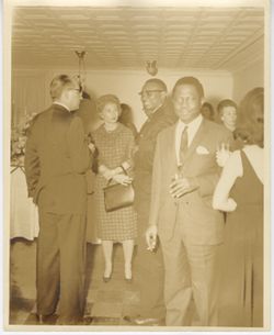 Mr. Garland Farmer, Miss Cecille Sternberg, H.E. Rodolph Grimes and Hon. W.W.K. Vanderbuye at reception