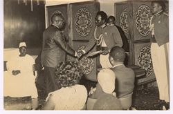 President William V. S. Tubman greets millitary official