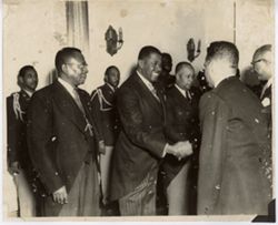 President William V. S. Tubman and officials greet guests at formal reception