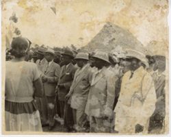 Crowd gathered around President William V. S. Tubman in a village