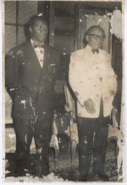 President William V. S. Tubman and man in formal dress stand together