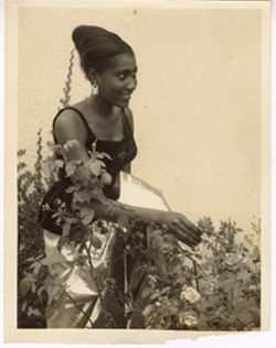 Portrait of Yahne King Sangre with flowers
