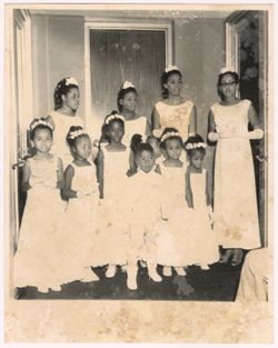 Portrait of flower girls and page boy