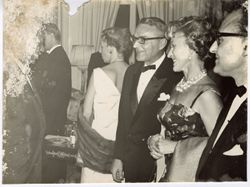 Guests mingle at a formal reception