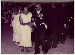 President Tubman dancing with fellow dignitaries