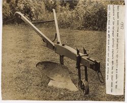 Heavy plow made by students of Galanague Mission School. Does work of fifty men per day