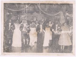 President William V. S. Tubman and Mrs. Tubman walk arm in arm with three couples