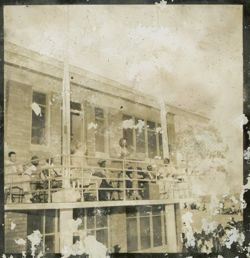 President Tubman and other dignitaries on a balcony