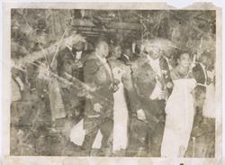 President William V. S. Tubman and Mrs. Tubman stand with guests during a formal event