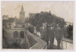 President Tubman and dignitaries walk along an elevated walk way