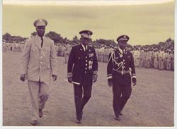 President Tubman walking with Major General Dominic Bing and General Judson Henry Green