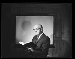 Dr. Powell A. Moore, author, reading his book "The Calumet Region: Indiana's Last Frontier", 1959