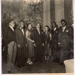 Ambassador and Mrs. Knight  pose with Senator and deputies for group portrait