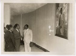Prime Minister of Ghana Kwame Nkrumah and two Ghanaian dignitaries view portrait of President Tubman