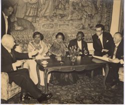 President and Mrs. Tubman in conversation with reception guests