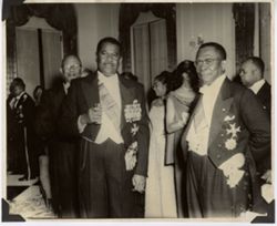 President William V. S. Tubman stands with dignitaries at formal reception