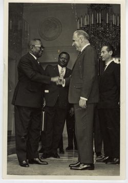 President William V. S. Tubman greet dignitary