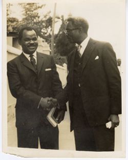 Charles T. O. King greets guest at his daughter's wedding in Lagos