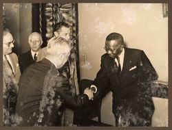Top officials of Fiat company welcoming President Tubman to the company