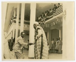President William V. S. Tubman is greeted by crowd and officials
