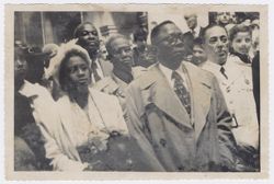 President and Mrs. Tubman surrounded by dignitaries