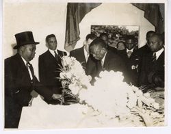 Attending to the wreath at funeral service