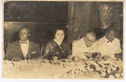Guests seated at formal dinner