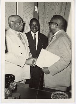 President William V. S. Tubman greets official