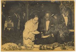 Young woman and President William V. S. Tubman at buffet table at dinner party