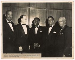 Left to right- Dr. Mack Hannah, Hon. Mayor deLesseps Morrison, His Excellency President Tubman and Ambassador Simpson, and Mr. Charles W. Pemberton, at reception at International House